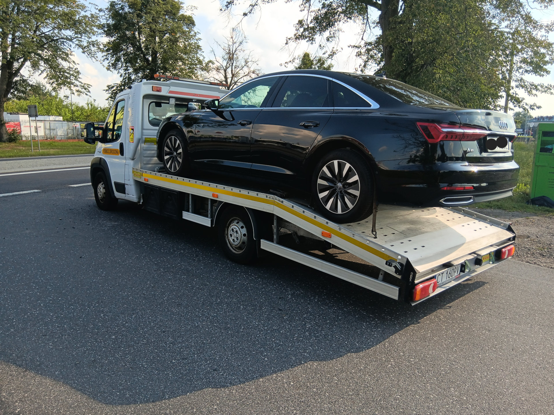 Laweta Toruń - transport samochodów i maszyn na prawocie